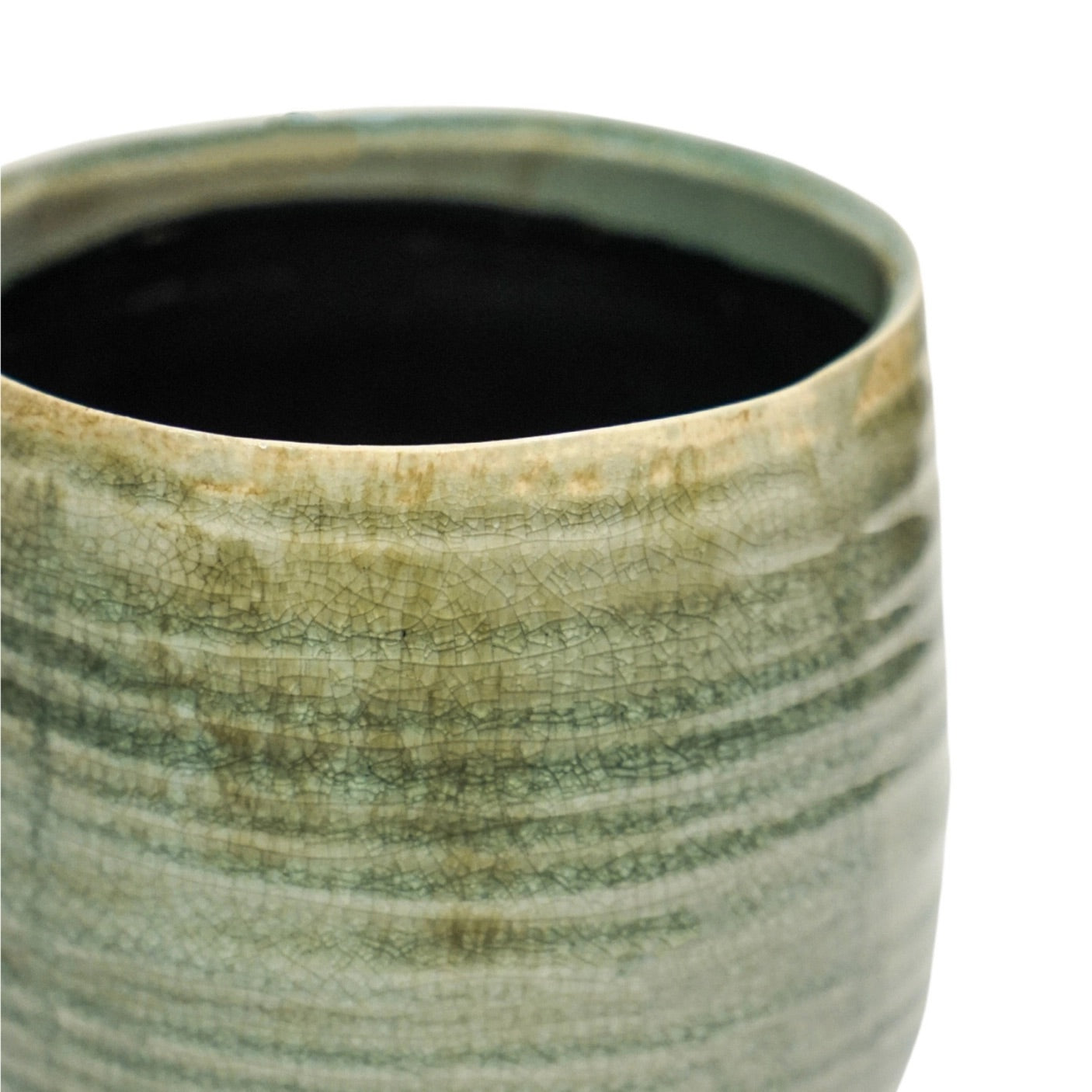 Close up showing glaze of pot.