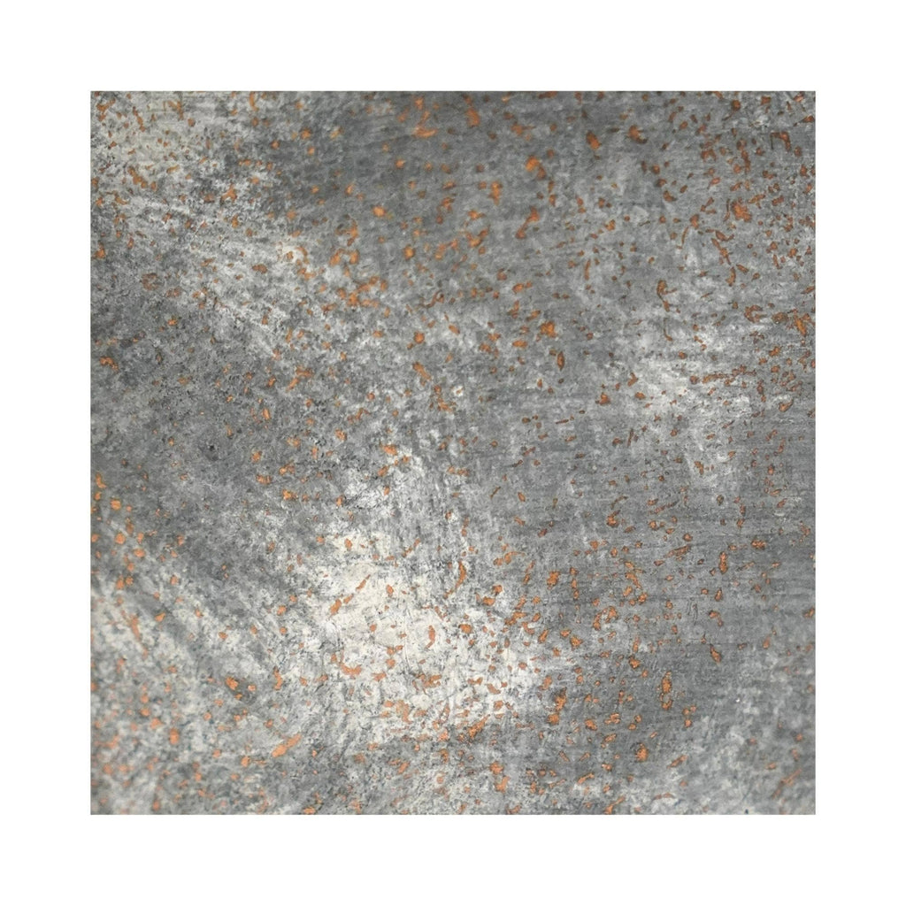 Close up shot showing texture and slight metallic glint on bowl.