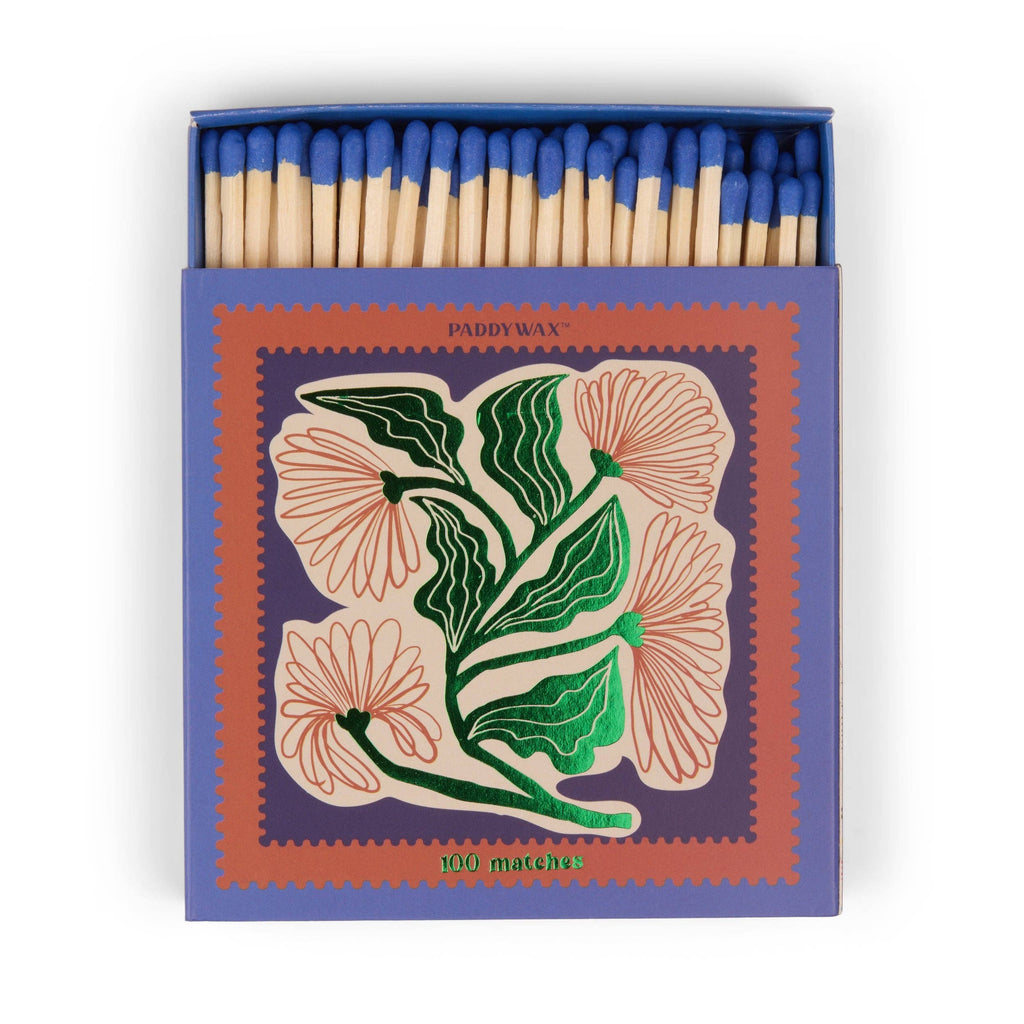 Matches with floral design on the box. Match heads are blue.