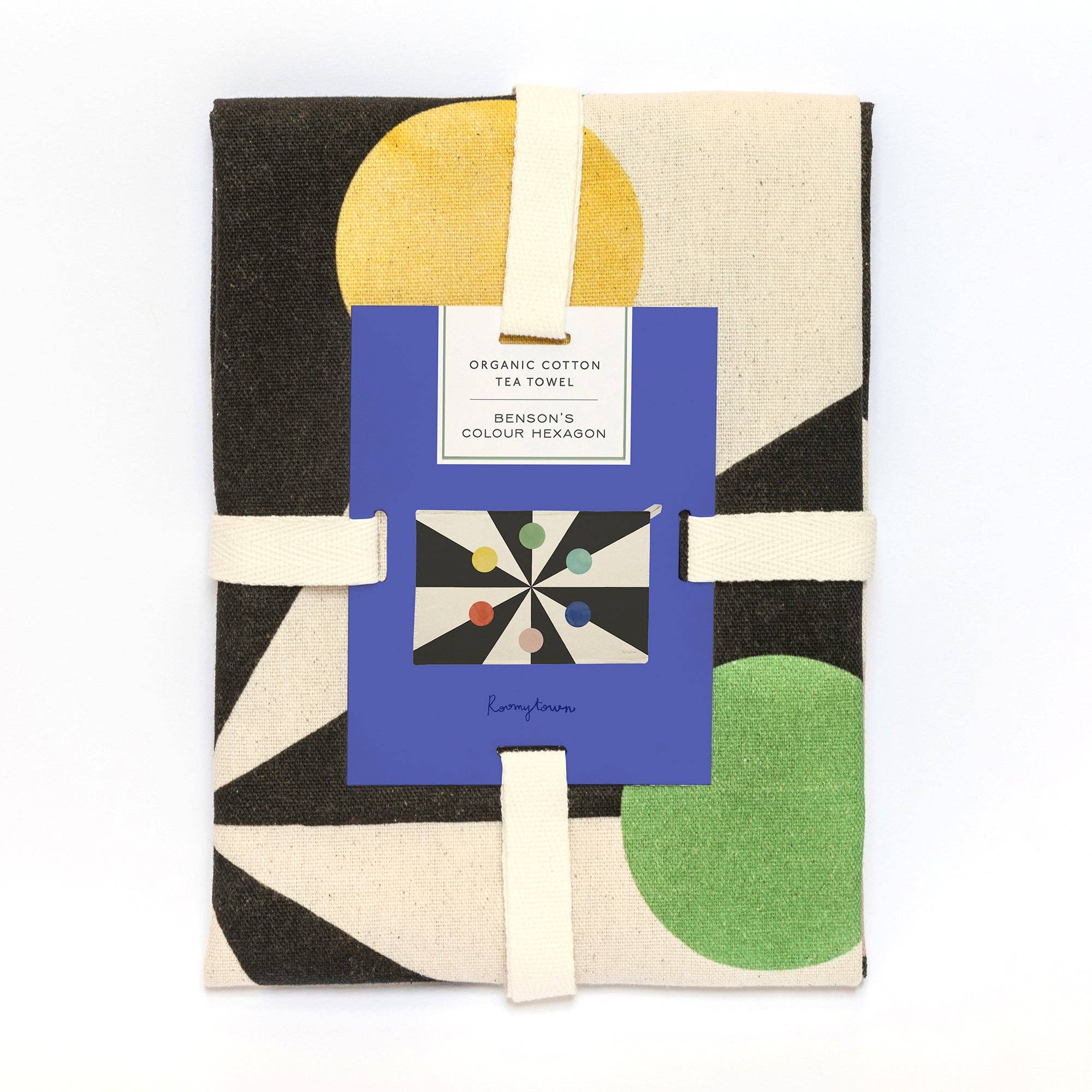 A colourful organic cotton tea towel wrapped in a ribbon ready for gifting. The design is taken from Benson's Colour hexagon design.