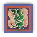 Matches box with floral design and 'PaddyWax' branding on a white background