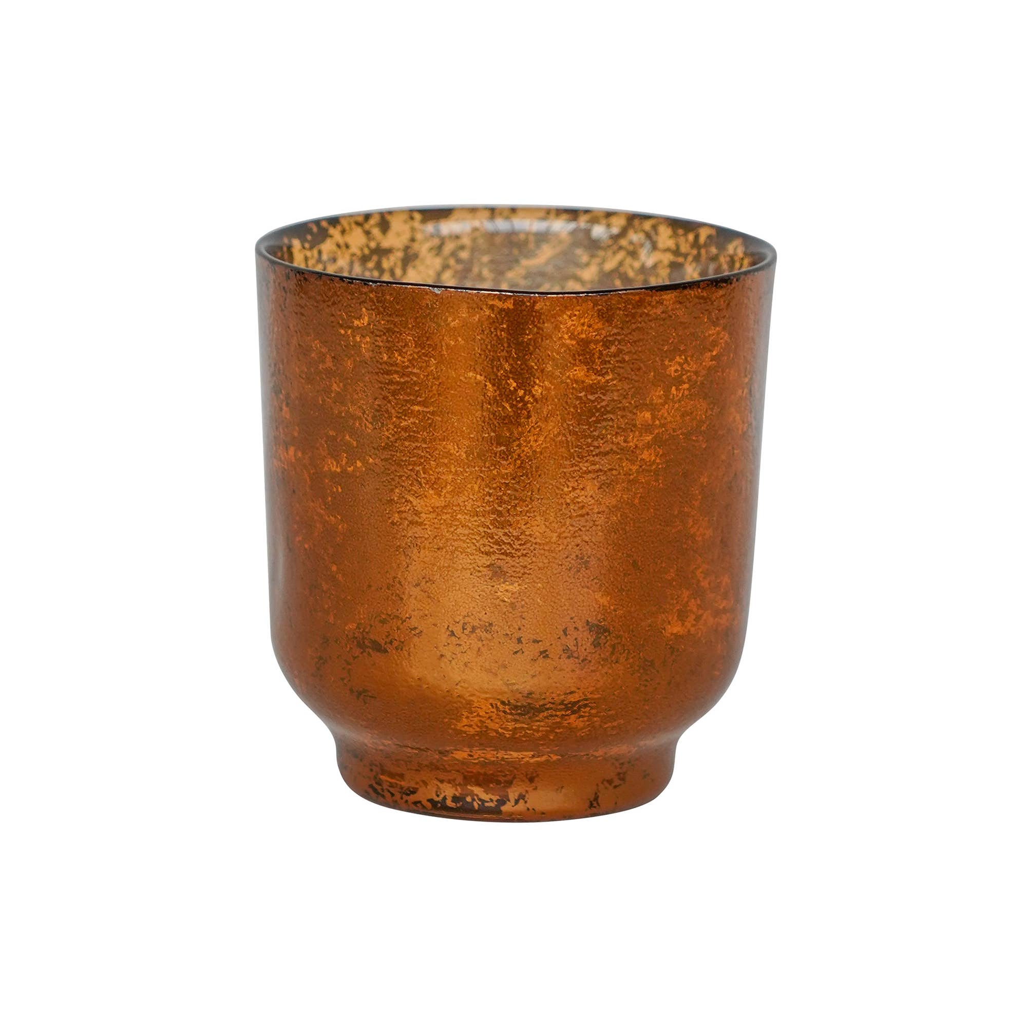 Studio shot of copper glass tea light holder on white background.