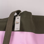 Detail of bag handle with tag from The Cornish Studio.