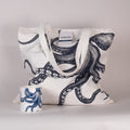 Tote bag with octopus design and matching octopus mug on a light background. Cream Cornwall gift bundle.
