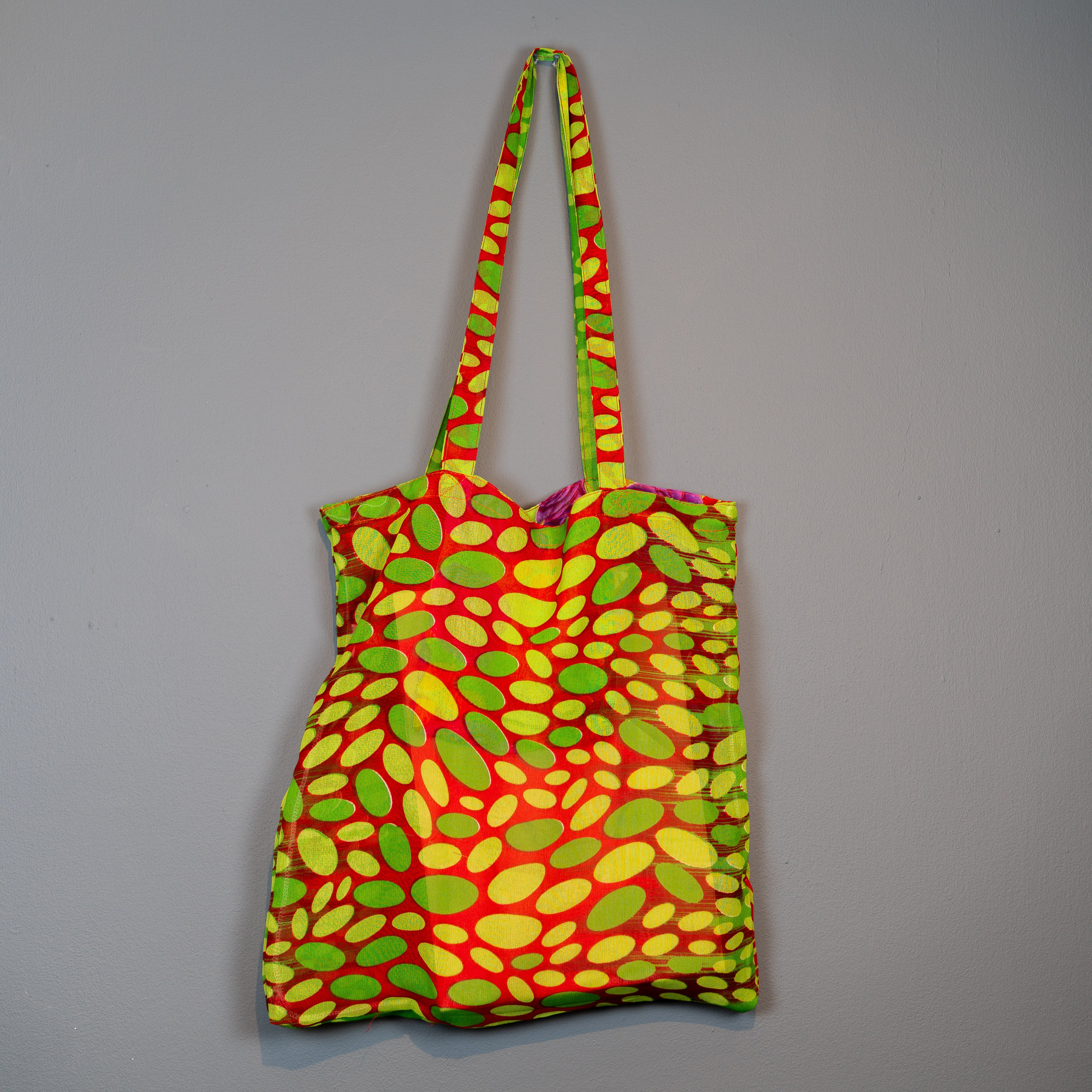 Multi coloured ovals design sari shopper.