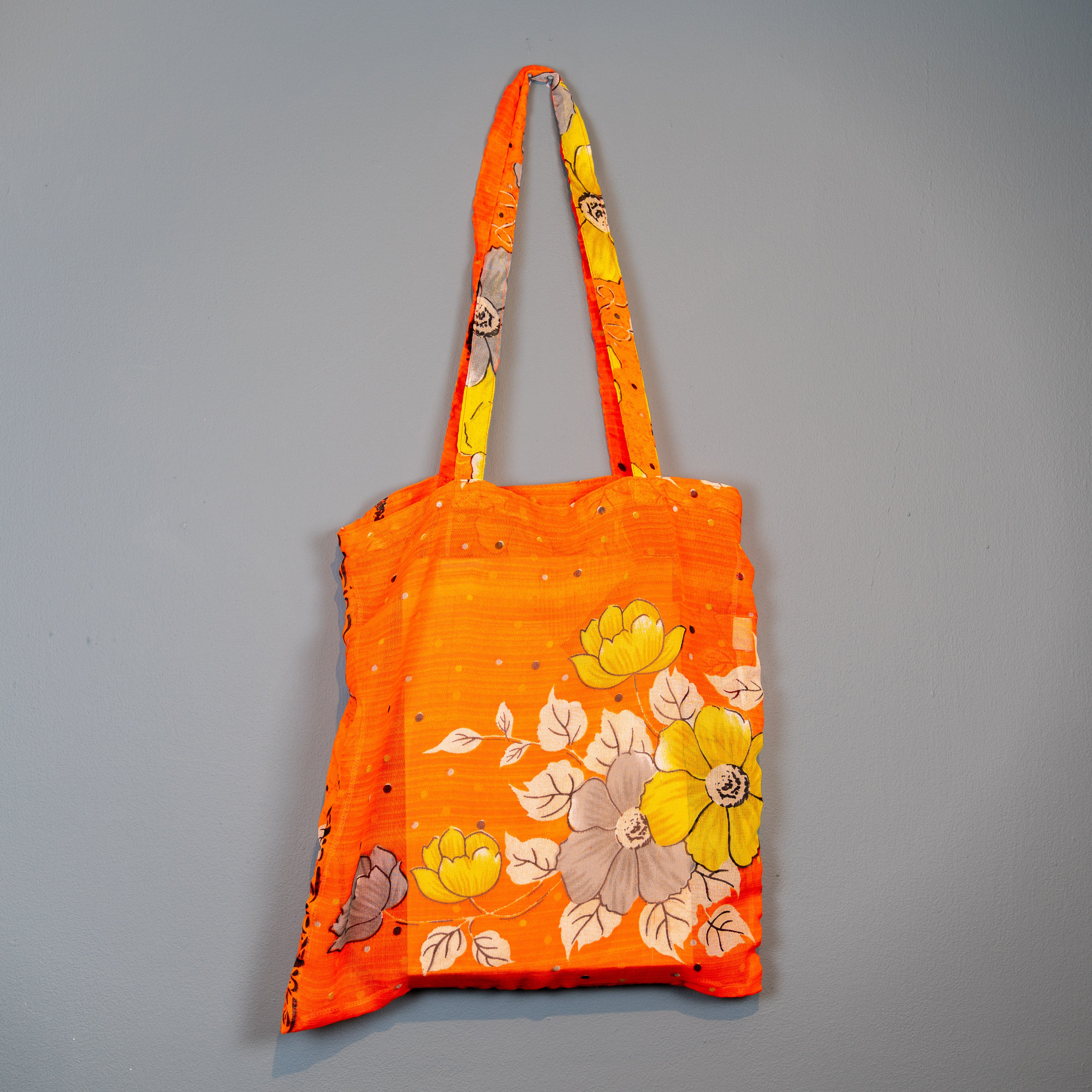 Orange flower design shopper.