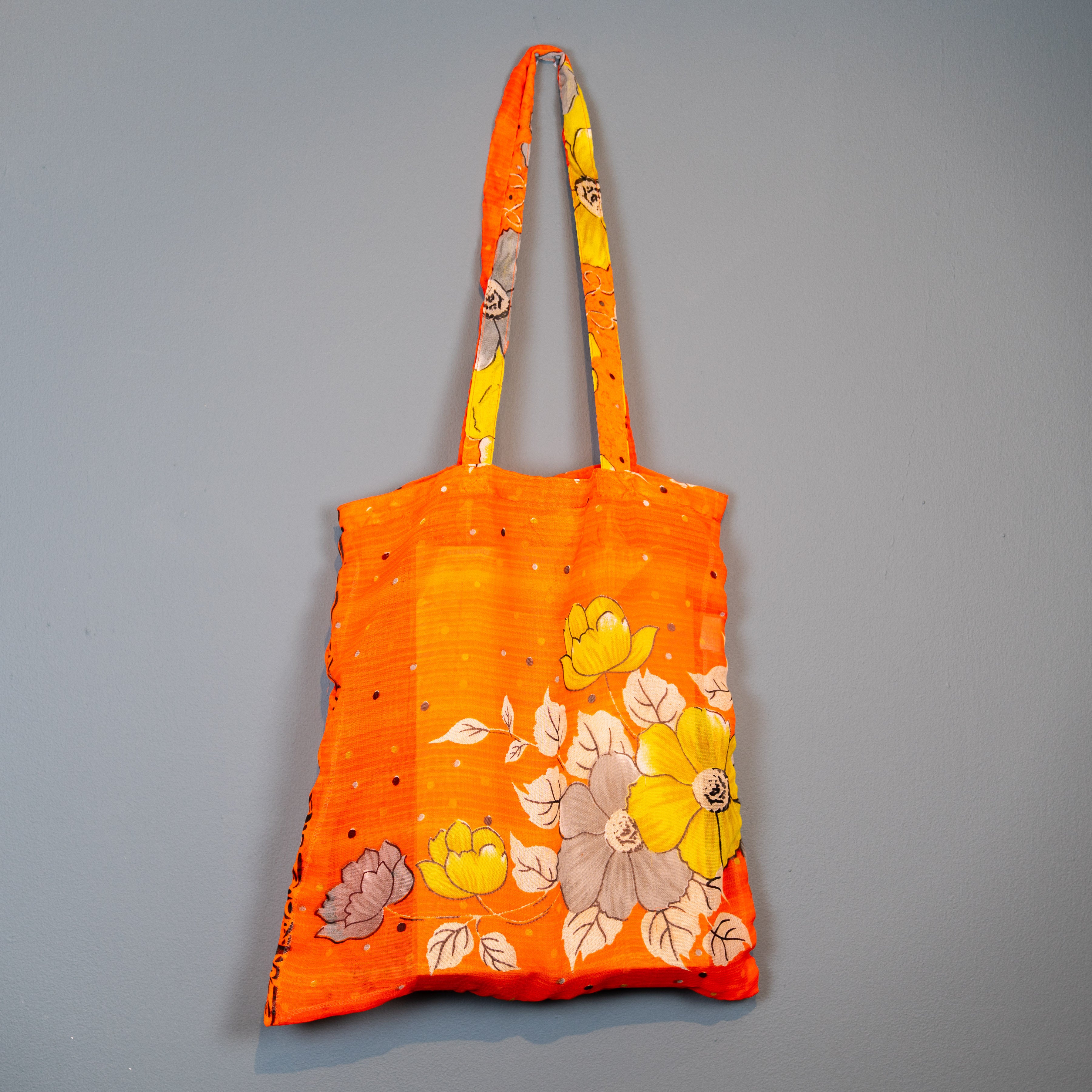 Orange flower design shopper.