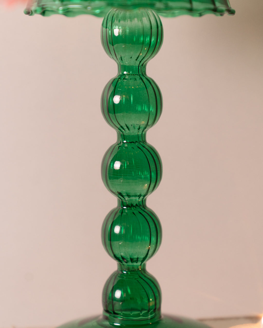 Multi Ball Lamp-Style Glass Tealight Holder in Summer Green close up.