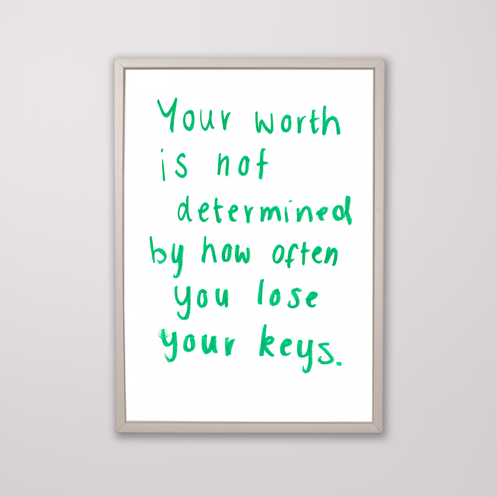 Framed motivational quote on a white background