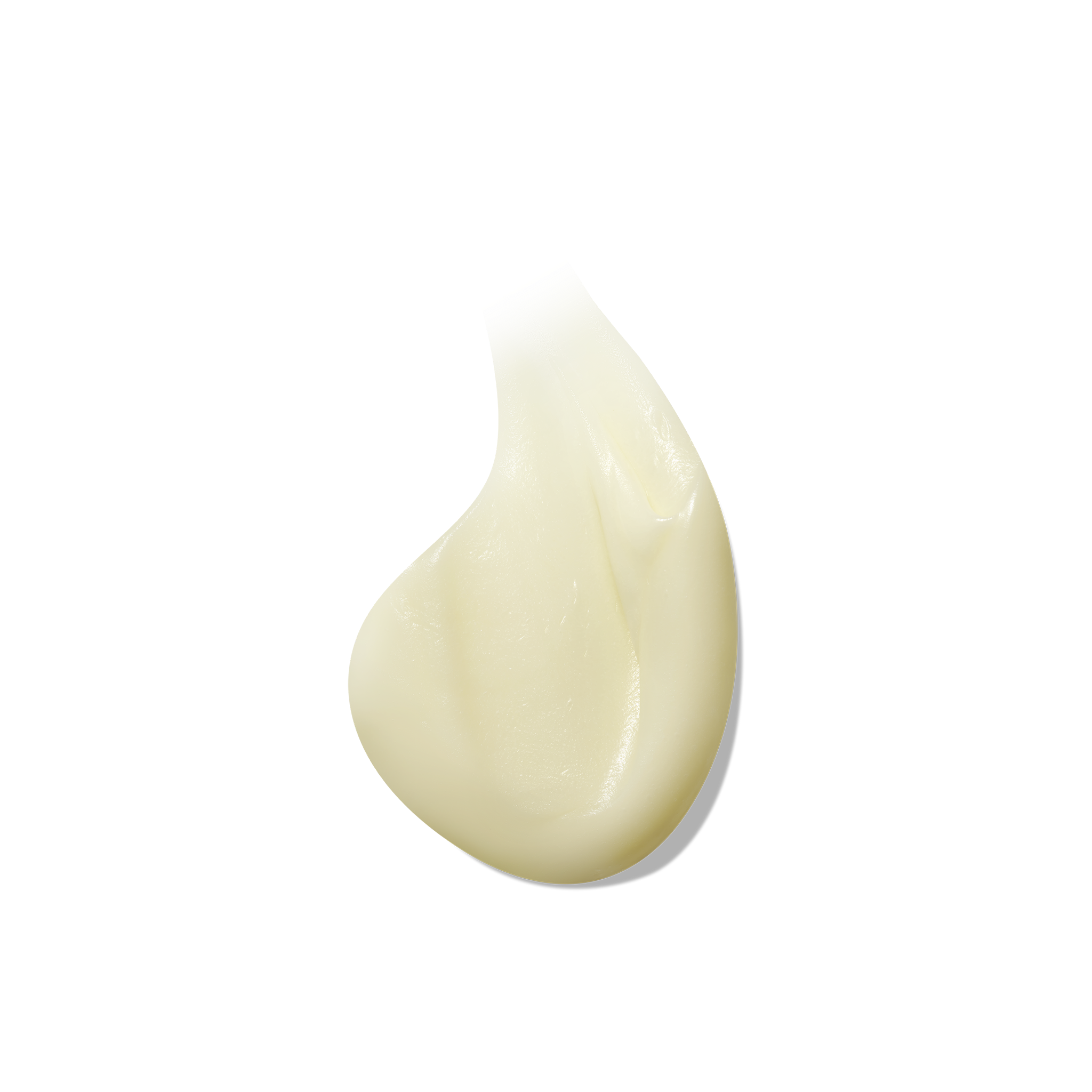 Cream coloured product on white background showing consistency of balm.