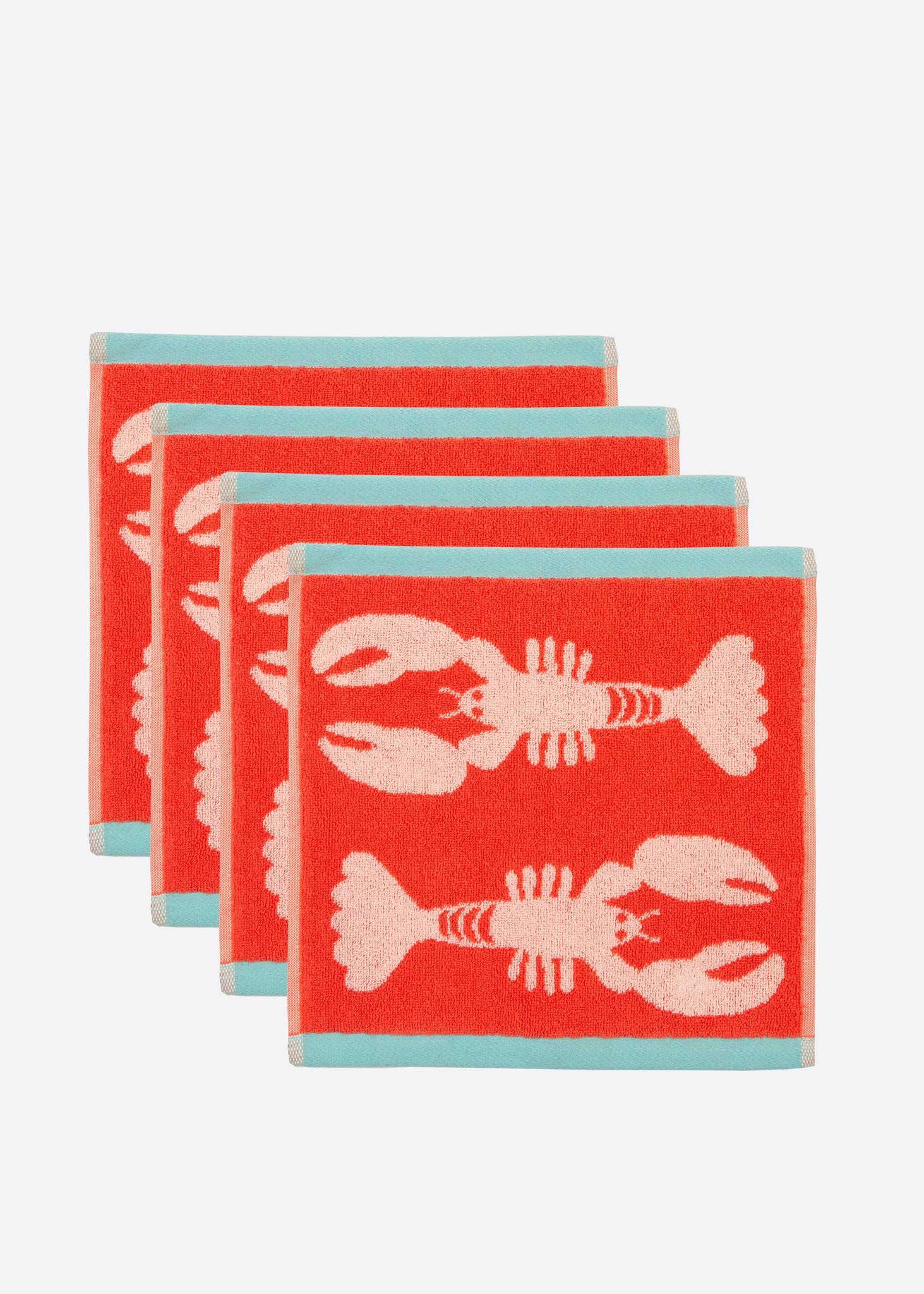 Set of four coral face cloths with white lobster designs on a white background.  100% organic cotton.