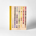 A5 lined notebook with a colorful spines and a grid of color names and corresponding color swatches on the cover. It's cover design draws inspiration from Werner's Nomenclature of Colours.